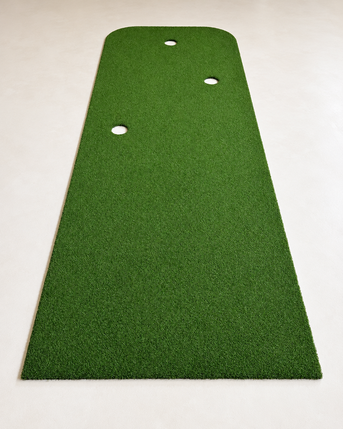 Multi-puttimatto 100 cm × 3 m suoran alkupään suunnasta. Kolme reikää, vaalea tausta.